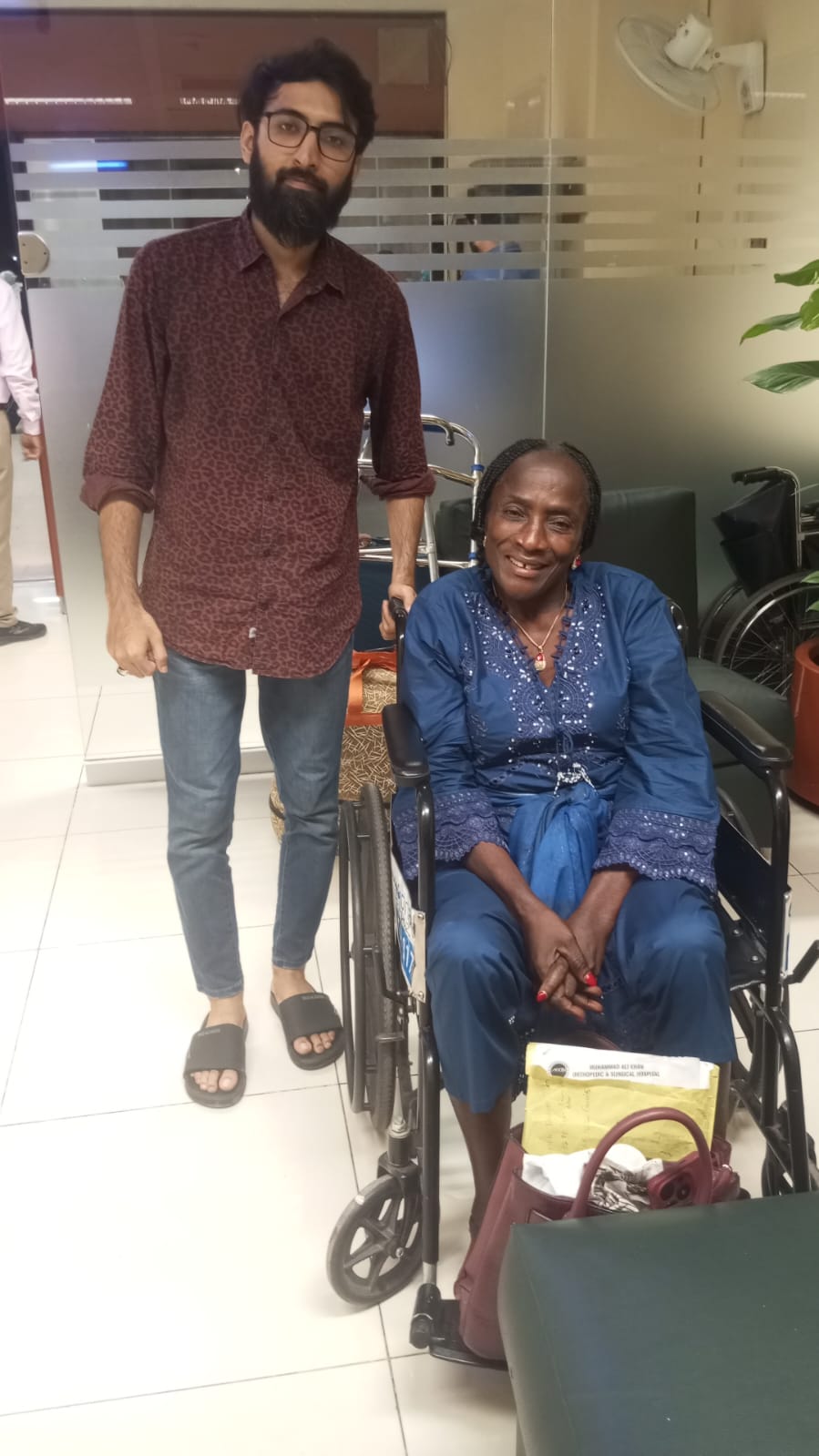 Patient and doctor walking together